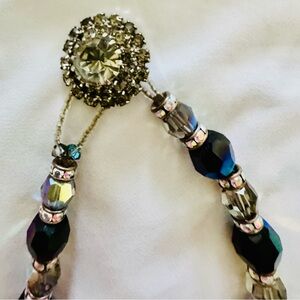 Silver and Black Ornate Necklace with Intricate Clasp